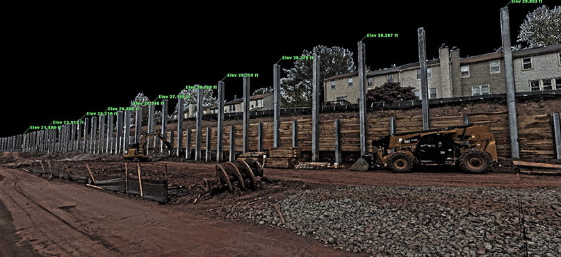 Digital model indicating elevation of installed H-beams on a roadway construction site in a residential area 