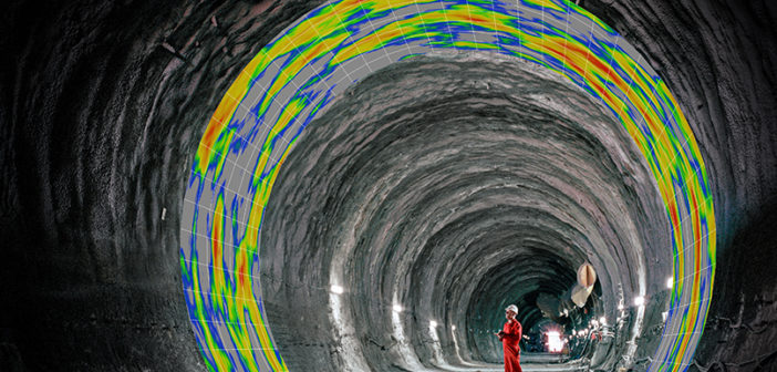 ScanCrete worker inside tunnel uses 3D laser scanning to inspect concrete wall thickness