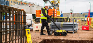 Surveyors using an underground utility detection mapping system