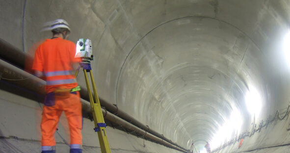 A surveyor using the Leica TS16 automated total station.